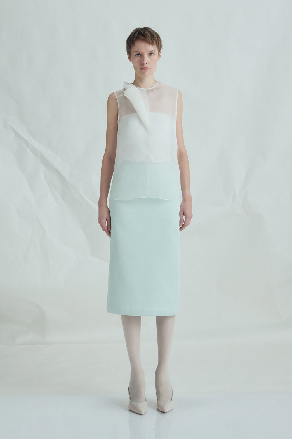 VICKTEERUT Sleeveless Blouse with Sculptural Rolled Fabric Detail เสื้อแขนกุด ตกแต่งผ้าม้วน