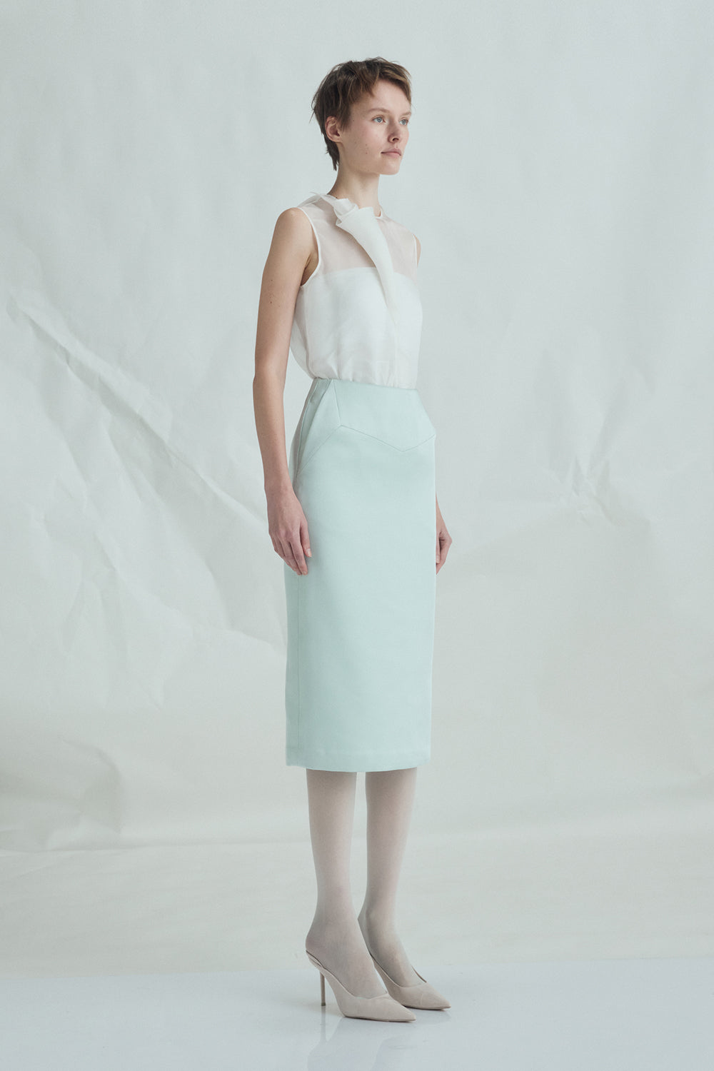 VICKTEERUT Sleeveless Blouse with Sculptural Rolled Fabric Detail เสื้อแขนกุด ตกแต่งผ้าม้วน