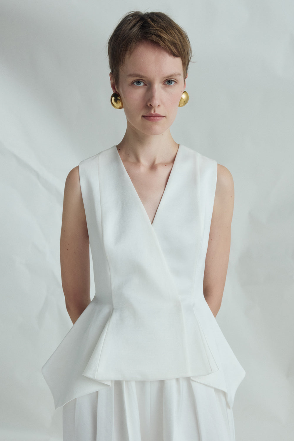 VICKTEERUT Sleeveless Peplum Blouse เสื้อแขนกุด ชายระบาย