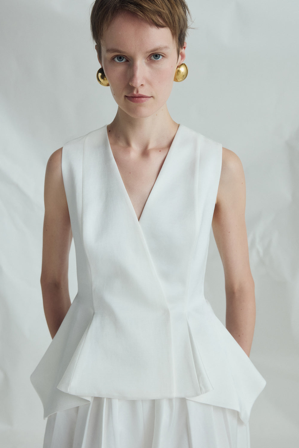 VICKTEERUT Sleeveless Peplum Blouse เสื้อแขนกุด ชายระบาย